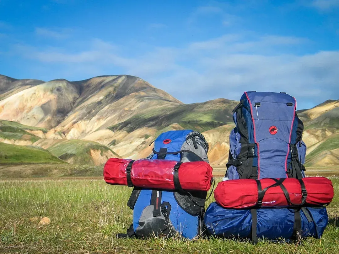 trekking gear packed in a backpack for a hike